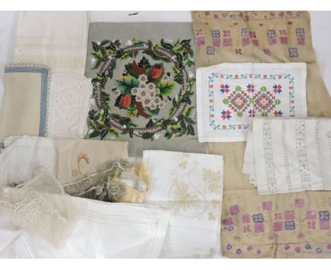 A quantity of linens and lace trims, to include linen napkins, table cloths, etc