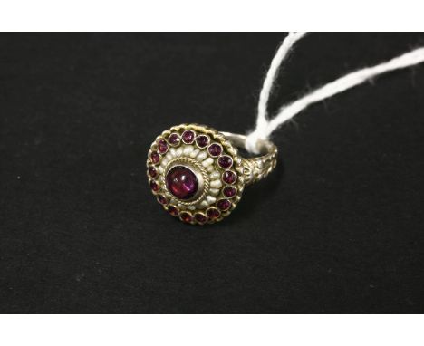 An Austro Hungarian foiled paste and seed pearl ring