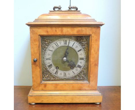 A Georgian style walnut mantel clock