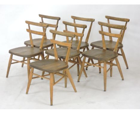 Seven Ercol child's chairs, with yellow badge, small