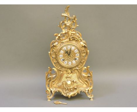 A Louis XVI style ormolu mantel clock