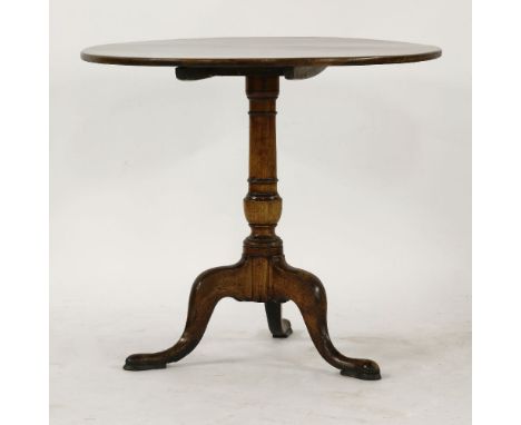 A George III mahogany circular top tripod table, 79cm diameter