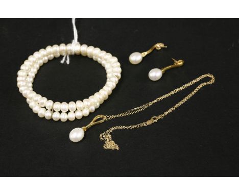 A gold pendant and earring suite, believed to be by Honora, with cultured freshwater pearls, marked 14K, together with a two 