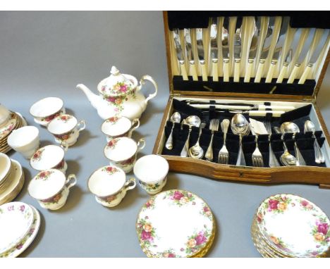 A Royal Albert 'Old Country Roses' six setting tea service, further tea wares, cup handle broken, and a cased six place setti