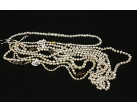A single row graduated cultured pearl necklace, a two row cultured freshwater pearl necklace, a single row cultured freshwate