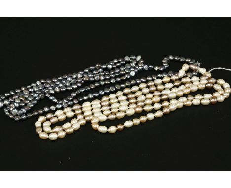 A single rope of cultured freshwater pearls, in white, pink and peach, together with a potato shaped cultured freshwater pear