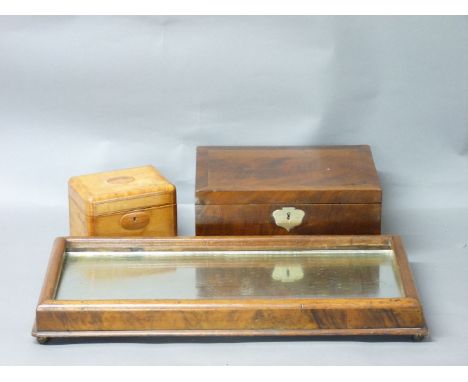 A mirrored table centrepiece, mahogany framed, 56cm long, a Victorian mahogany box, converted into a humidor, 29.5cm wide, an