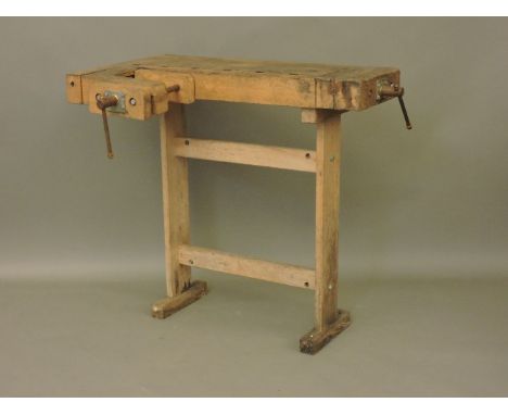 A small wooden carpentry work bench