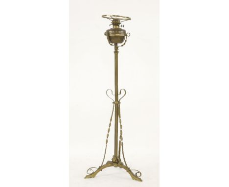 An Art Nouveau brass standard oil lamp, with a telescopic column, 133cm high
