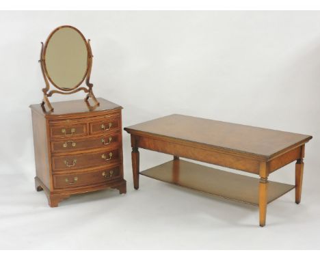 A small chest, two over three drawers, 58 x 48 x 66cm, a reproduction coffee table, 120 x 60cm, and a toilet mirror