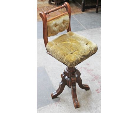 A Victorian adjustable piano stool.