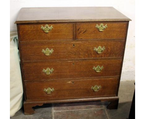 A Georgian oak chest of drawers on bracket feet, width 109cm, depth 53.5cm & height 108.5cm.