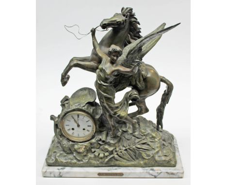 A late 19th Century French spelter figural mantel clock on marble base, the enamel dial signed 'Raingo Fres Paris', the base 