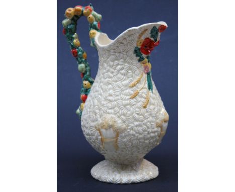 A Clarice Cliff Art Deco pottery "Harvest" jug, height 29cm. CONDITION REPORT - good restoration to handle.
