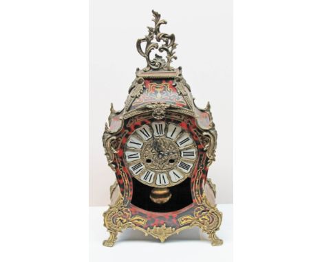 A French brass inlaid boulle mantel clock, height 57cm. CONDITION REPORT - boulle lifting to sides, no further damage/repair,