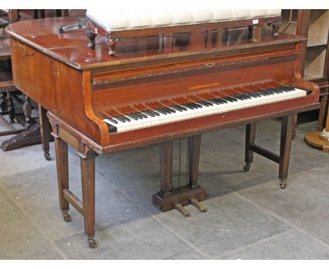 A John Broadwood & Sons walnut baby grand piano, width 141cm, length 155cm & height 99cm.