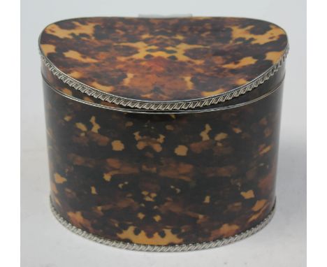 A Georgian style faux tortoiseshell and silver plated tea caddy, height 13cm. CONDITION REPORT - good, old repair to hinge ot