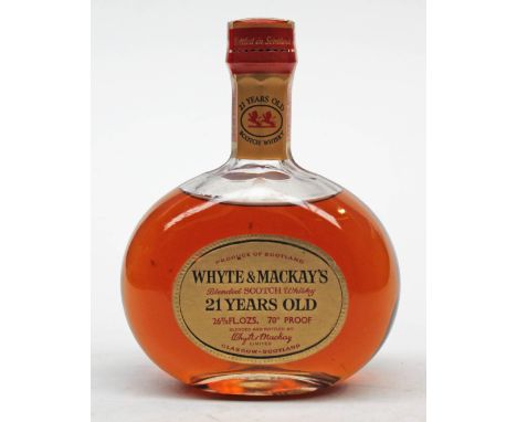Whyte & Mackay's 21 years old blended Scotch whisky, 26 2/3 fl ozs, 70 proof.