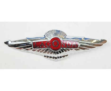 A Lagonda enamel and chrome classic car badge, length 17cm. PROVENANCE - the car badges lots 189-196 have been bought from ne