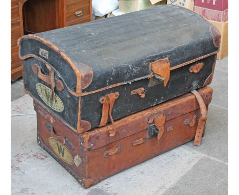 Two Finnigans of Manchester vintage leather steamer trunks.
