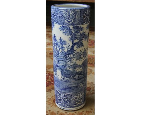 An oriental blue & white porcelain stick stand, height 61.5cm. CONDITION REPORT - a number of firing imperfections including 