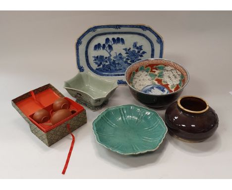 A Chinese Imari bowl with famille noire floral decorated exterior, a 20th Century Yi Xing miniature teapot and two bowls boxe