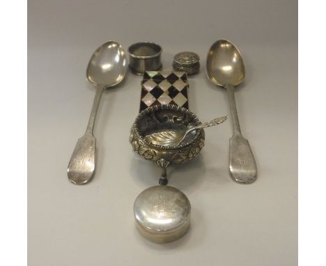 A collection of silver wares to include a pair of Victorian silver table spoons (Exeter 1852), a caddy spoon with shell shape