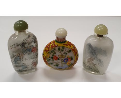 Two Chinese reverse painted scent bottles one signed, together with a further glass and enamel decorated scent bottle depicti