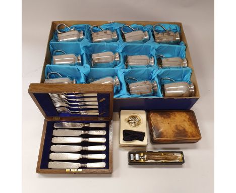 A vintage Mappin &amp; Webb cardboard box containing twelve plated half tankards inscribed with the letter "L", an oak cased 