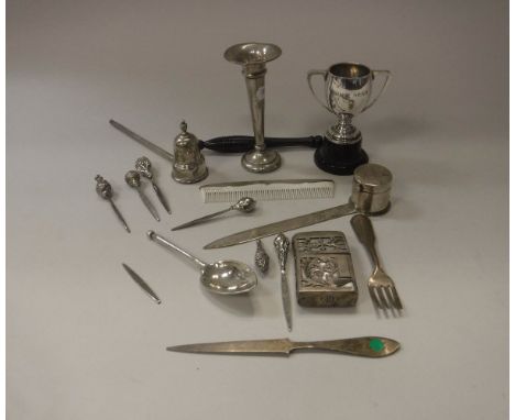 A collection of silverwares to include spill vase, small twin handled trophy cup, candle snuffer with turned wood handle, a l