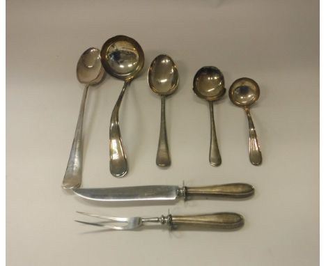 Four Continental white metal serving spoons including sauce ladle and a large plated spoon with rats tail and a pair of sterl