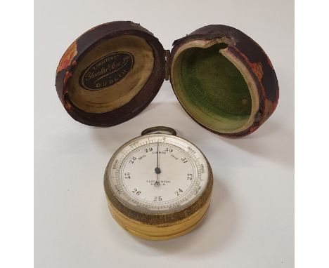 A 19th Century Yeates &amp; Sons of Dublin pocket barometer housed in leather case together with a silver mounted pincushion 
