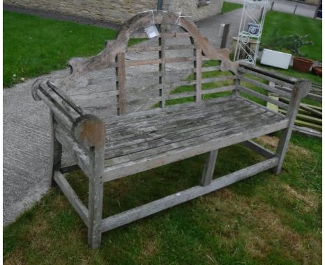 A teak "Lutyens" design garden bench
