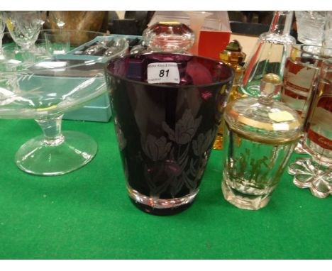 An etched amethyst glass beaker vase decorated with tulips signed to base "Webb", a Bohemian amber glass and cut dressing tab