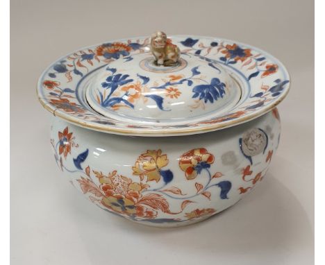 A Chinese Imari pot and cover with all over blue underglaze and oxide red and gilt overglaze floral decoration, the cover wit