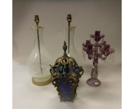 A pair of crackle glass baluster shaped table lamps, an amethyst glass four branch five light candelabra, Rococo style brass 