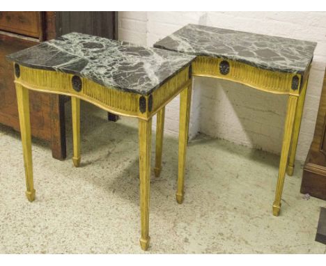 CONSOLE TABLES, a pair, Louis XVI style giltwood of inverted serpentine outline with verde antico marble tops on fluted taper
