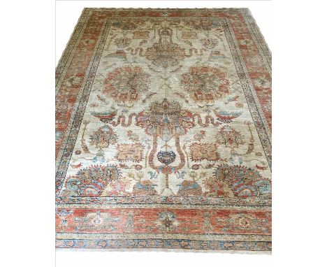 FINE FEREGHAN CARPET, 292cm x 203cm, of large safavid coral and aquamarine palmettes on ivory field within corresponding bord