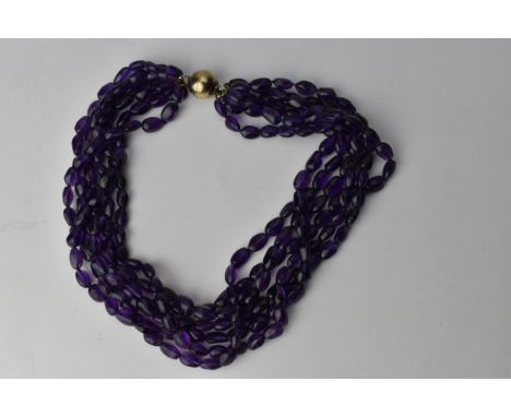 A six row amethyst bead necklace with a magnetic clasp, 46cm long