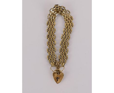 A 9ct gold gate link bracelet with a padlock clasp and safety chain makers mark ASJ, 15.7g 