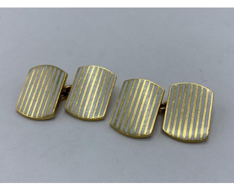 A pair of 18ct gold chain link cufflinks with white enamel banding 16.8 x 11.9mm, 15.3 grams 