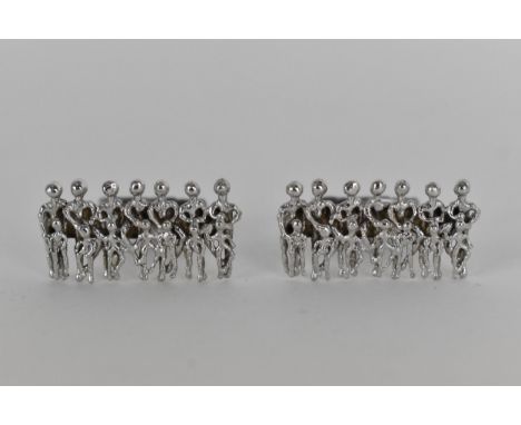 A pair of 1970's 18ct white gold cufflinks by Stuart Devlin, cast with figures with original box, 14.9g 