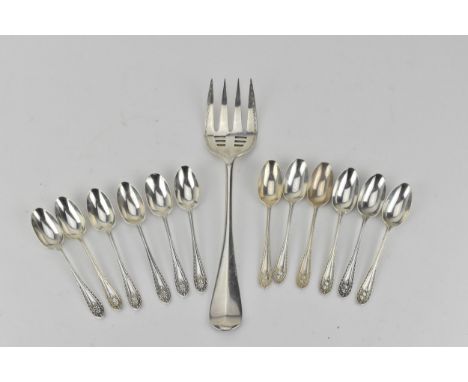 Early 20th century flatware, comprising of a set of twelve neo classical style teaspoons by Josiah Williams London 1927 and a