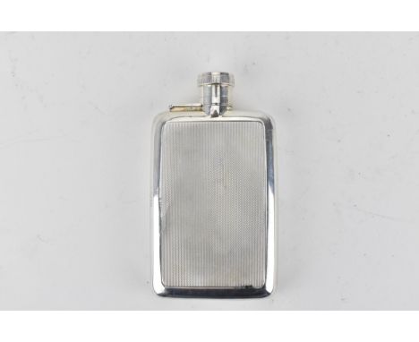 A mid 20h century silver hip flask by Mappin &amp; Webb, London 1954, with a hinged cap and engine turned decoration, 13.5cm 