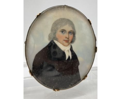 An early 19th century double sided portrait  miniature, mourning brooch, watercolour on ivory, one side depicting a young man