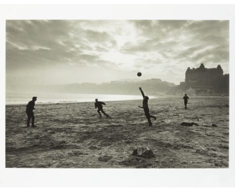 Sir Donald McCullin, CBE Hons FRPS,British b.1935- Fishermen playing football during their lunch break, Scarborough, Yorkshir