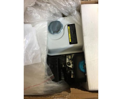 A boxed as new petrol engine