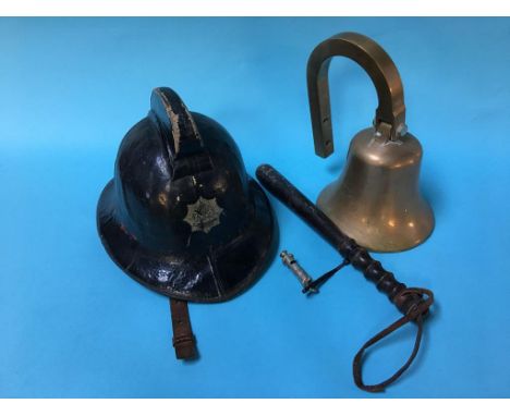 A fireman's helmet, a brass bell and a truncheon etc.