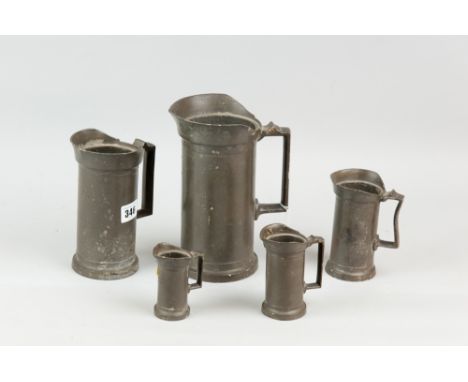 A set of five French cast pewter style measures of tankard form, marked 'Litre', 'Demi-Litre', 'Double Deci-Litre', 'Deci-Lit