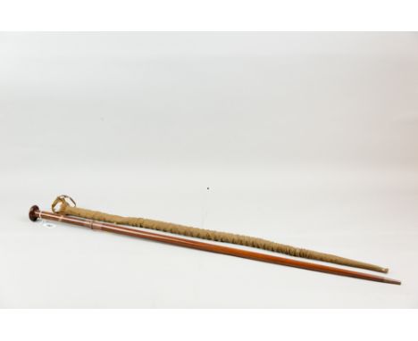 A Victorian sword stick, a good quality wooden shaft with metal tip and collar, the bladed top section similarly collared wit